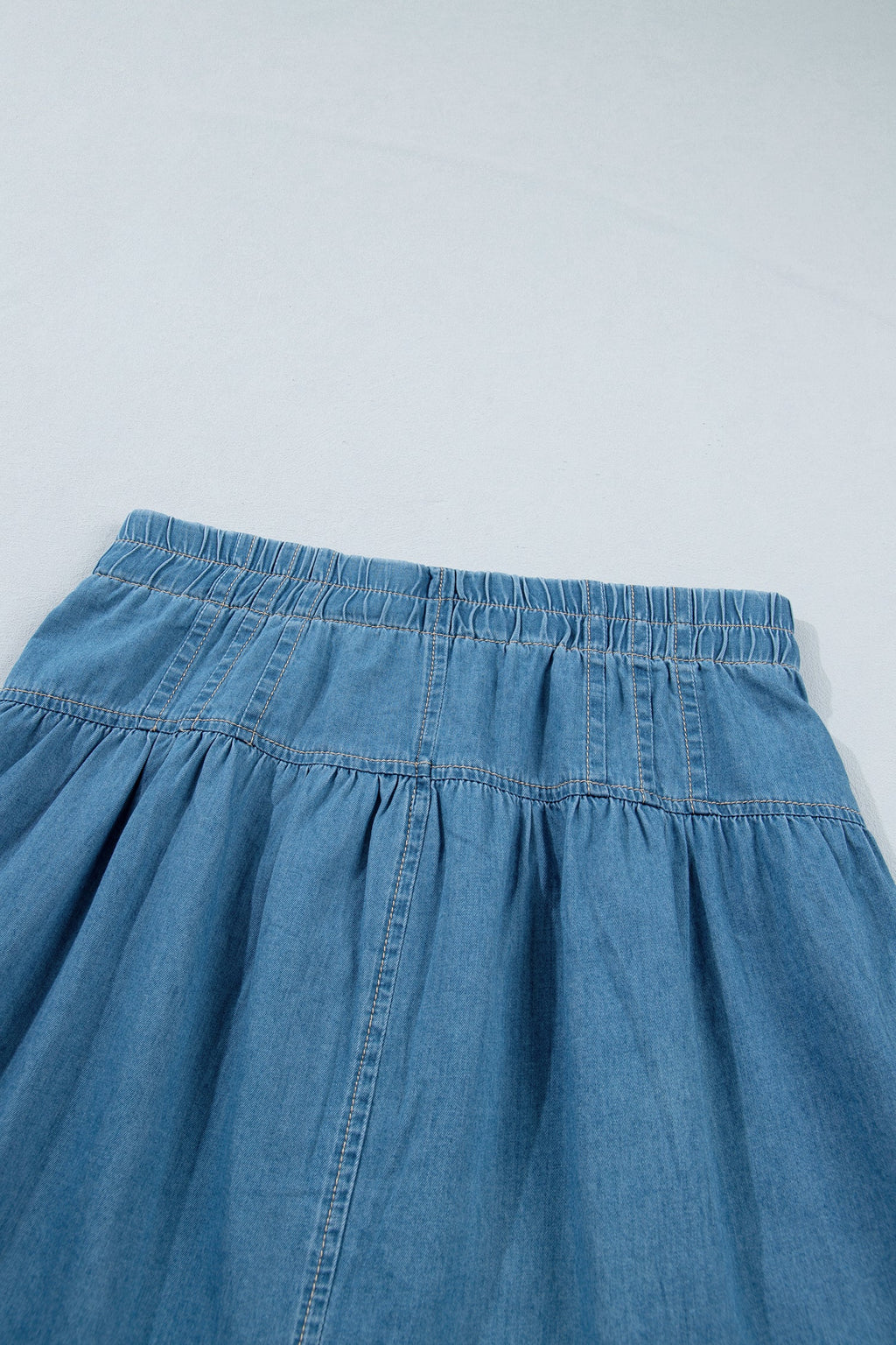 Sky Blue Half Buttons Pleated High Waist Denim Mini Skirt with Drawstring