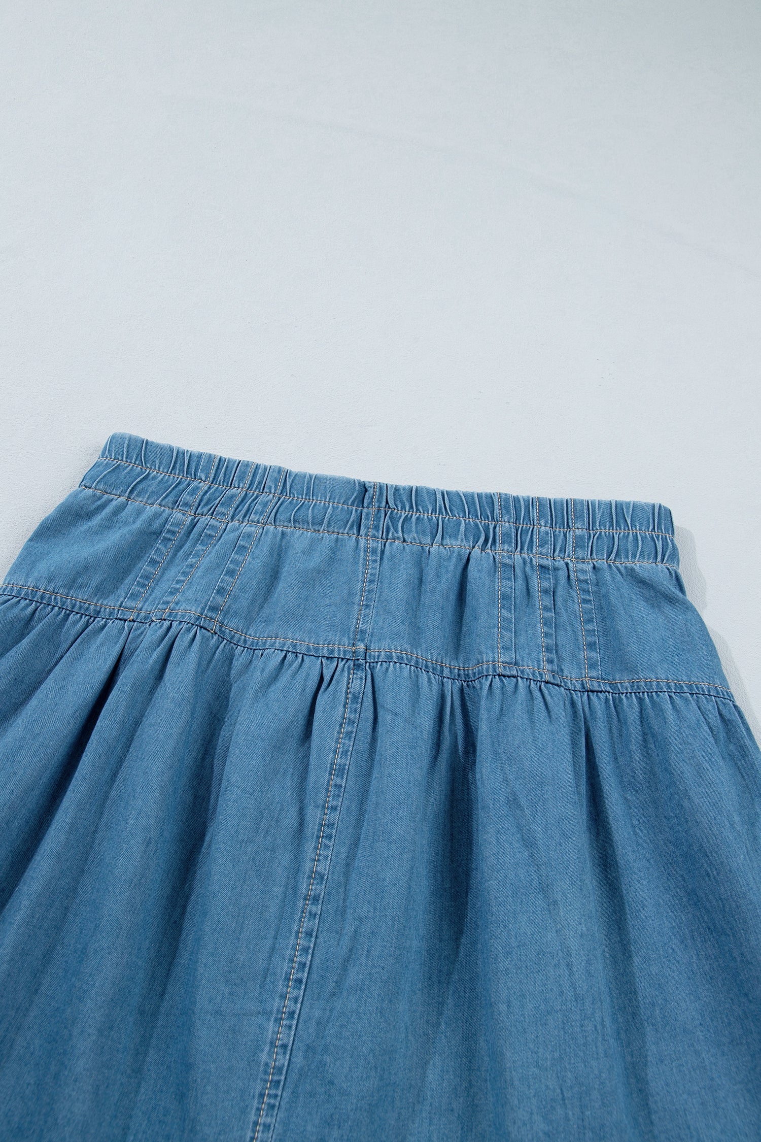 Sky Blue Half Buttons Pleated High Waist Denim Mini Skirt with Drawstring