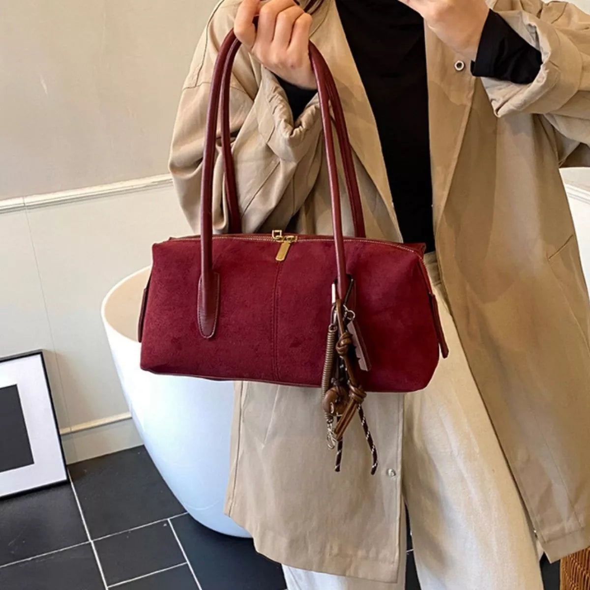 Elegant Suede Shoulder Bag with Pendant