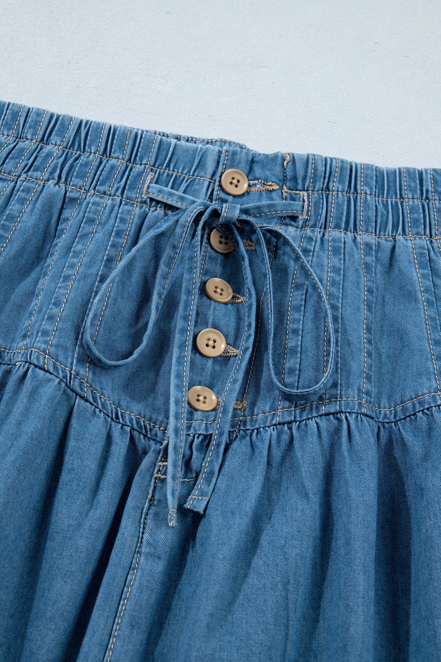 Sky Blue Half Buttons Pleated High Waist Denim Mini Skirt with Drawstring