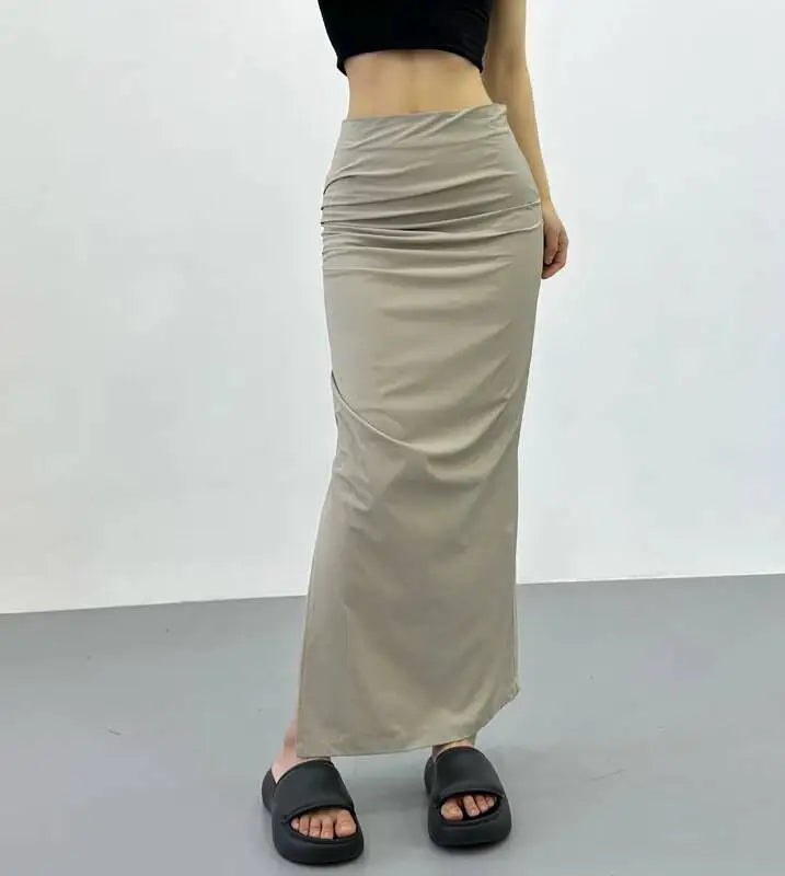 2026 New Pleated Side High Slit Half Length Skirt Women's Summer Spicy Girl Pure Desire Slim Wrap Hip Solid A-line Skirt 7MHN