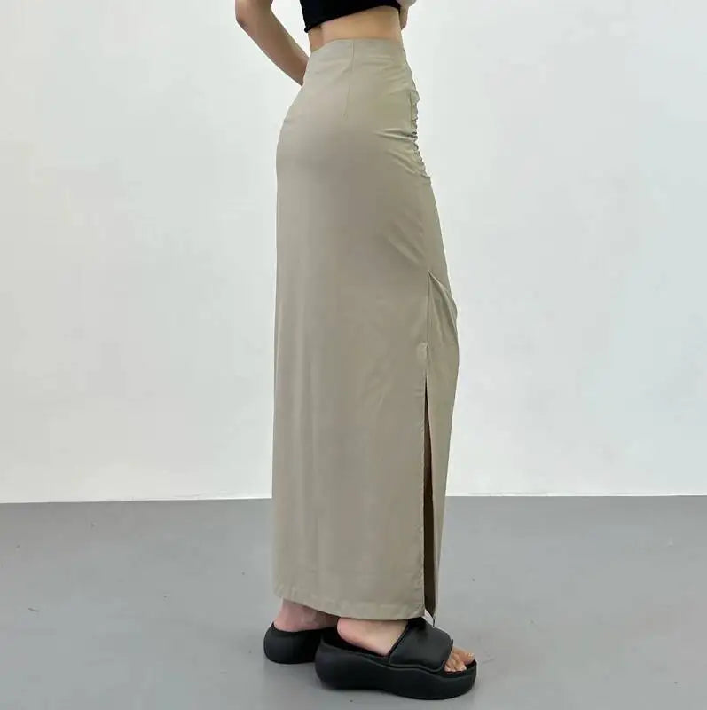 2026 New Pleated Side High Slit Half Length Skirt Women's Summer Spicy Girl Pure Desire Slim Wrap Hip Solid A-line Skirt 7MHN