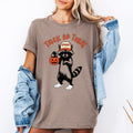 Trick Or Treat, Feral Raccoon Halloween Mischief Edition Spooky Nighttime Vibes Graphic Tee